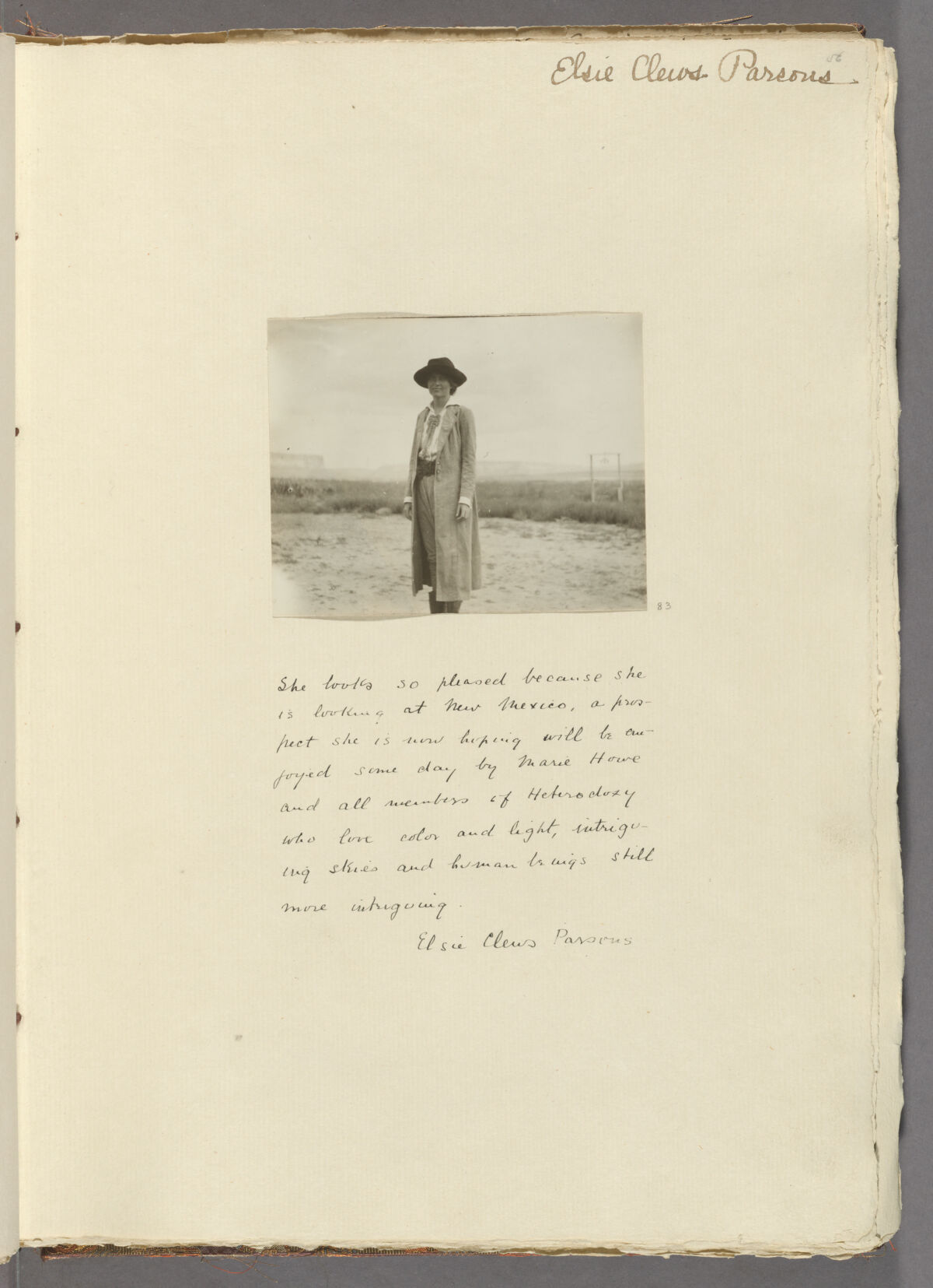 photo of Parsons standing amid sand in a scrapbook