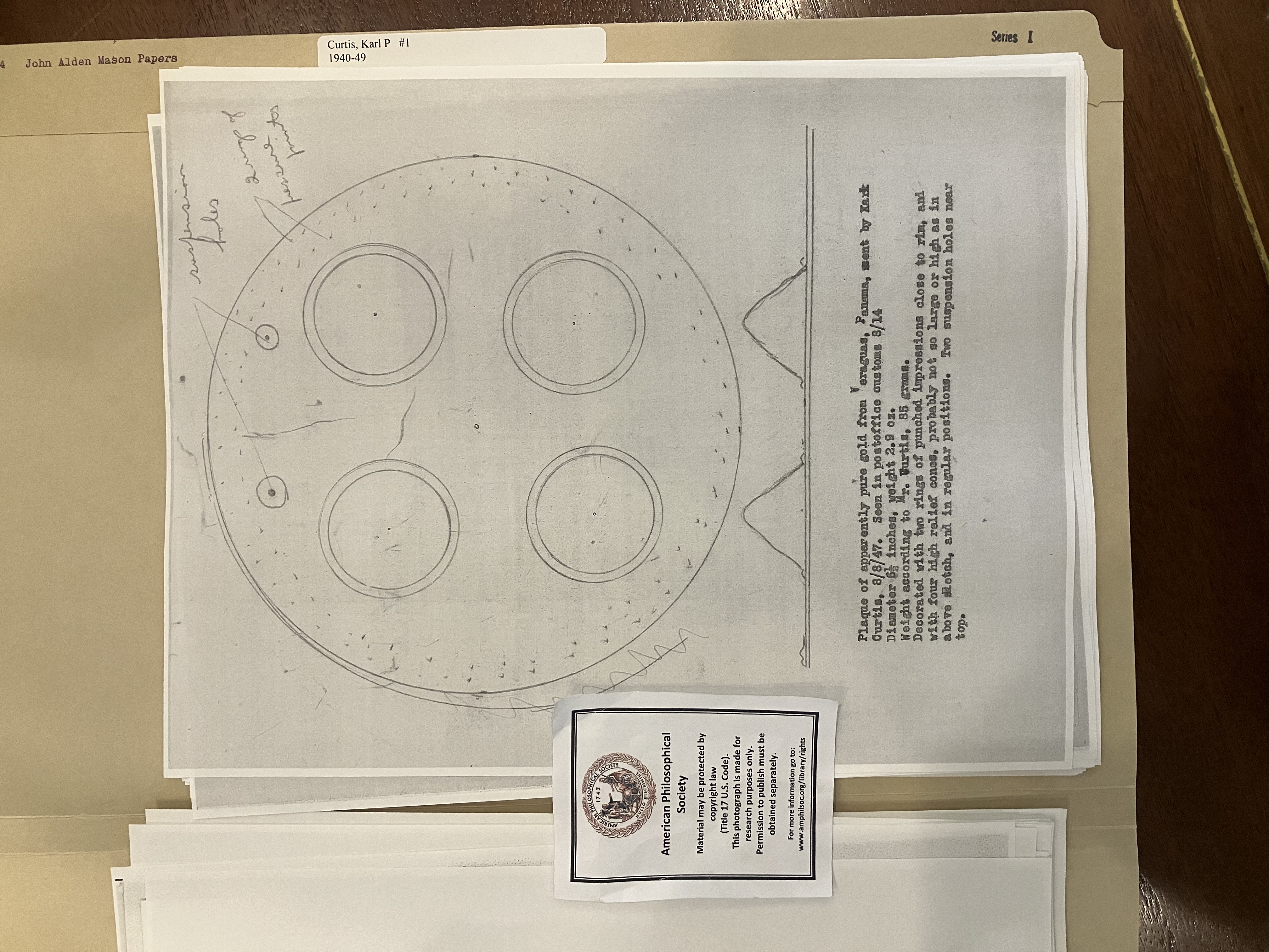 photo of photocopies of drawing in folder