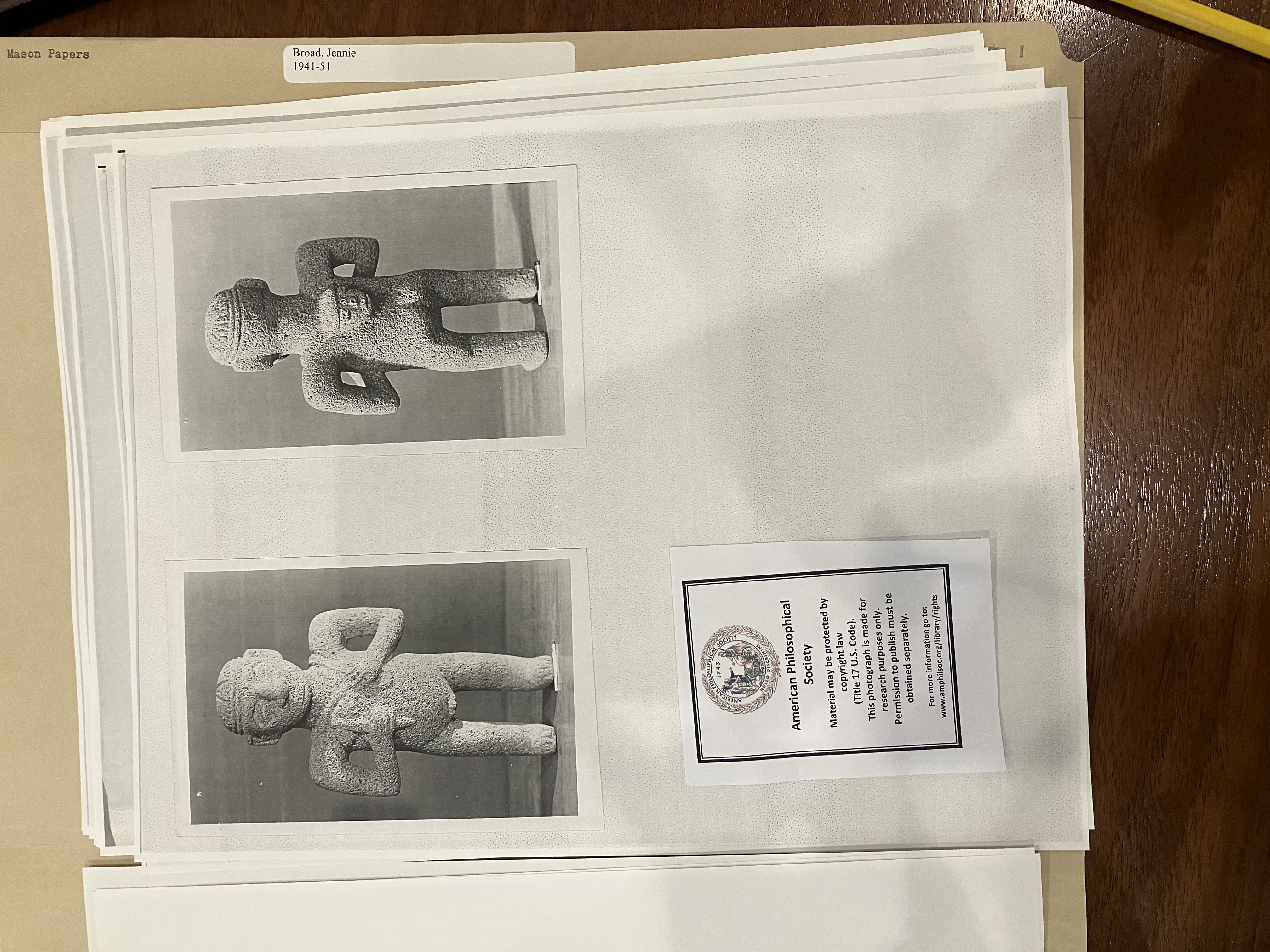 photo of photocopies of sculptures in folder