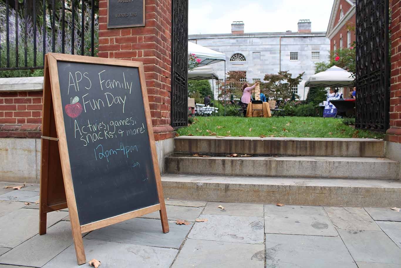 APS Family Fun Day image with view of chalkboard sign and Jefferson Garden 